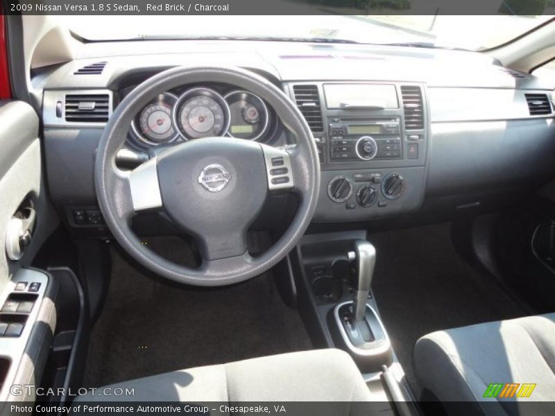 Red Brick / Charcoal 2009 Nissan Versa 1.8 S Sedan