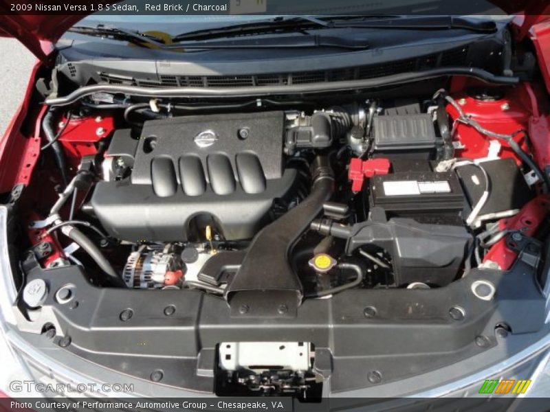 Red Brick / Charcoal 2009 Nissan Versa 1.8 S Sedan