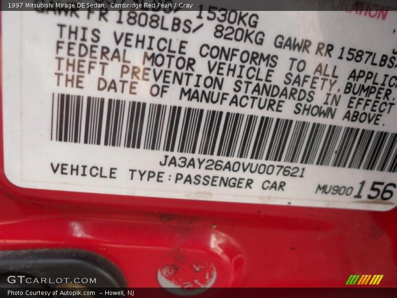 Cambridge Red Pearl / Gray 1997 Mitsubishi Mirage DE Sedan