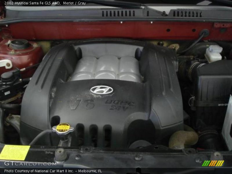 Merlot / Gray 2002 Hyundai Santa Fe GLS AWD