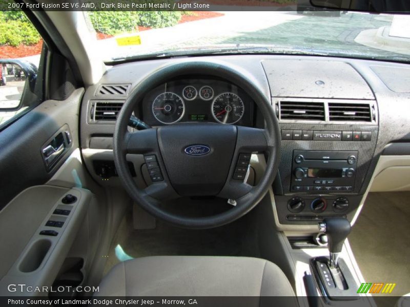 Dark Blue Pearl Metallic / Light Stone 2007 Ford Fusion SE V6 AWD