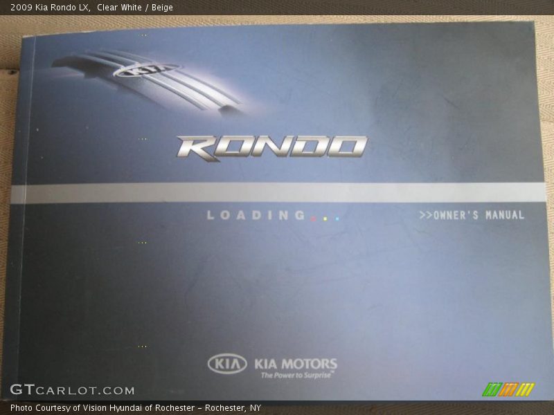 Clear White / Beige 2009 Kia Rondo LX