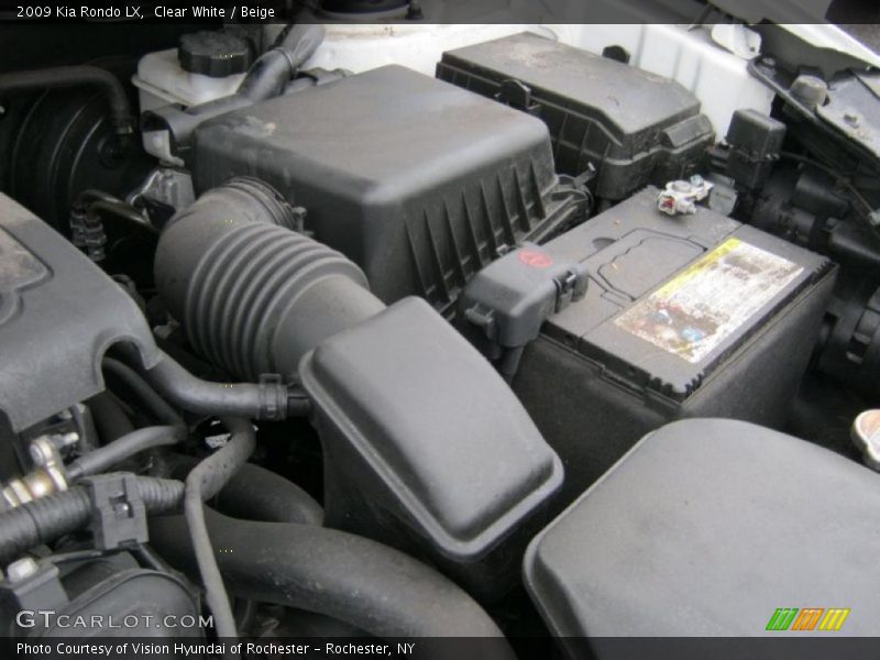 Clear White / Beige 2009 Kia Rondo LX
