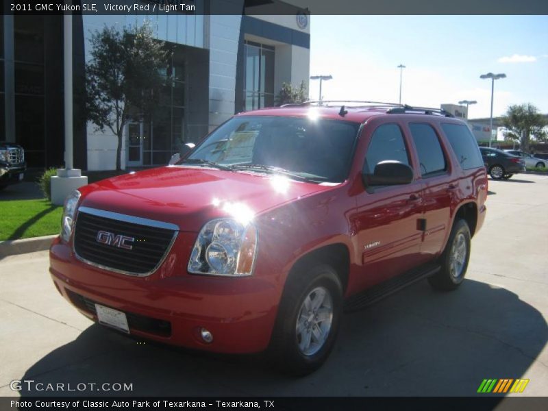 Victory Red / Light Tan 2011 GMC Yukon SLE