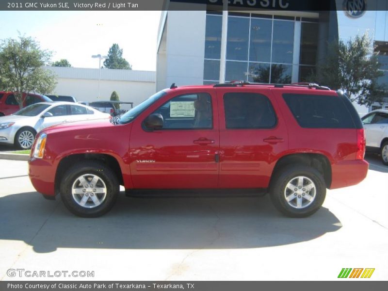 Victory Red / Light Tan 2011 GMC Yukon SLE