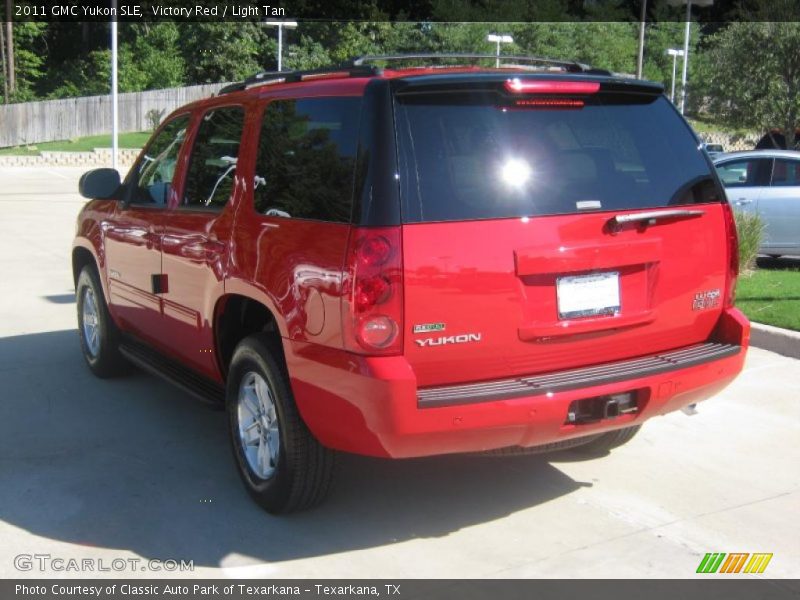Victory Red / Light Tan 2011 GMC Yukon SLE