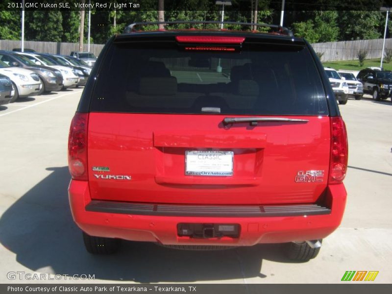 Victory Red / Light Tan 2011 GMC Yukon SLE