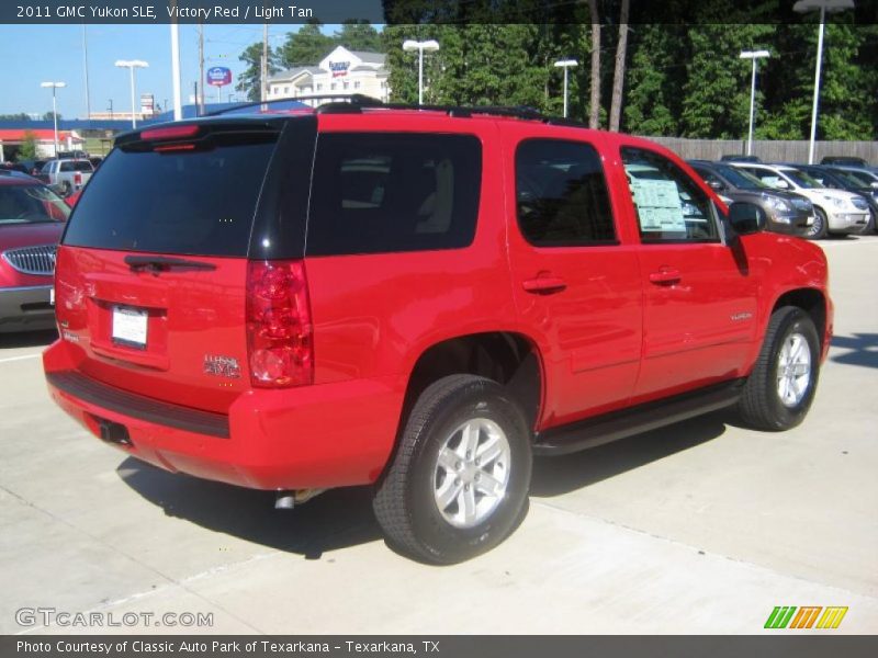 Victory Red / Light Tan 2011 GMC Yukon SLE