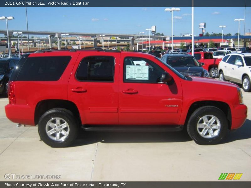 Victory Red / Light Tan 2011 GMC Yukon SLE