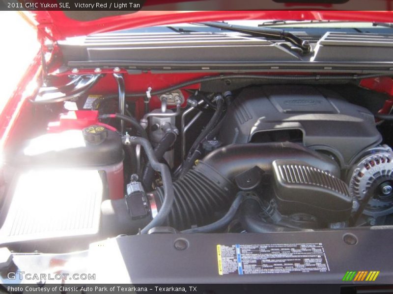 Victory Red / Light Tan 2011 GMC Yukon SLE