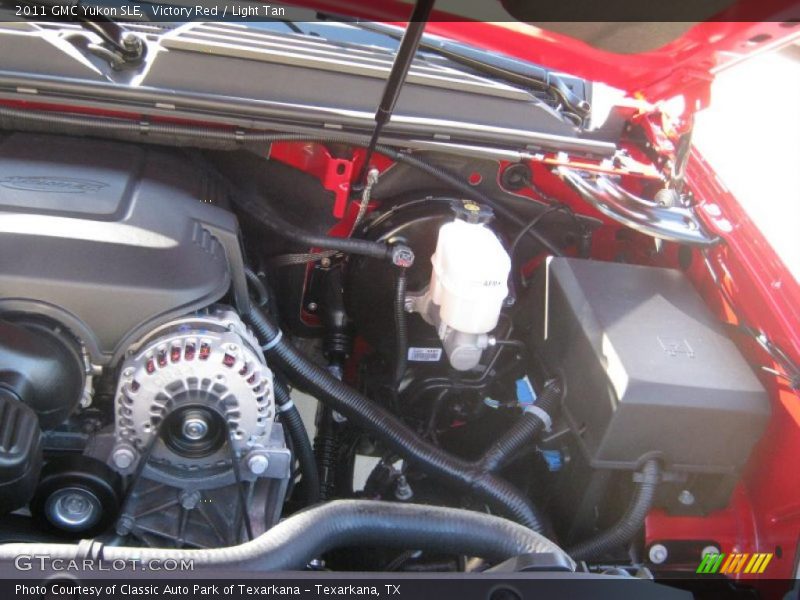 Victory Red / Light Tan 2011 GMC Yukon SLE