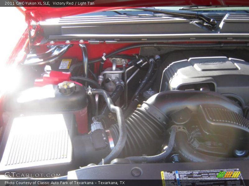 Victory Red / Light Tan 2011 GMC Yukon XL SLE