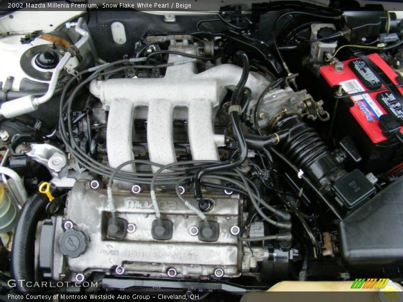 Snow Flake White Pearl / Beige 2002 Mazda Millenia Premium