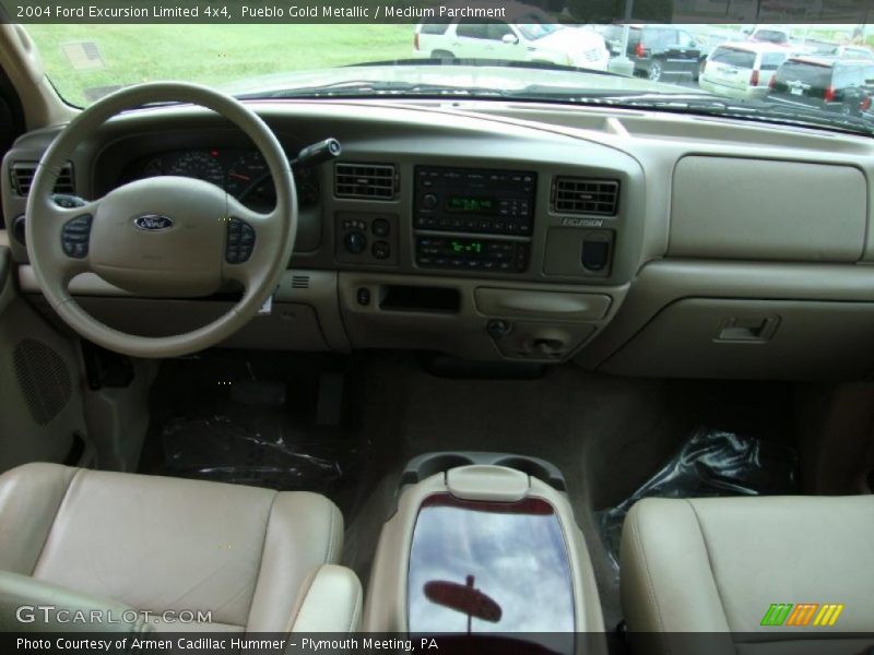 Pueblo Gold Metallic / Medium Parchment 2004 Ford Excursion Limited 4x4