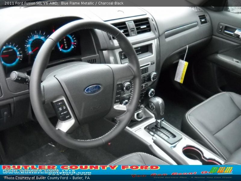 Blue Flame Metallic / Charcoal Black 2011 Ford Fusion SEL V6 AWD