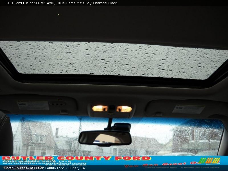 Blue Flame Metallic / Charcoal Black 2011 Ford Fusion SEL V6 AWD