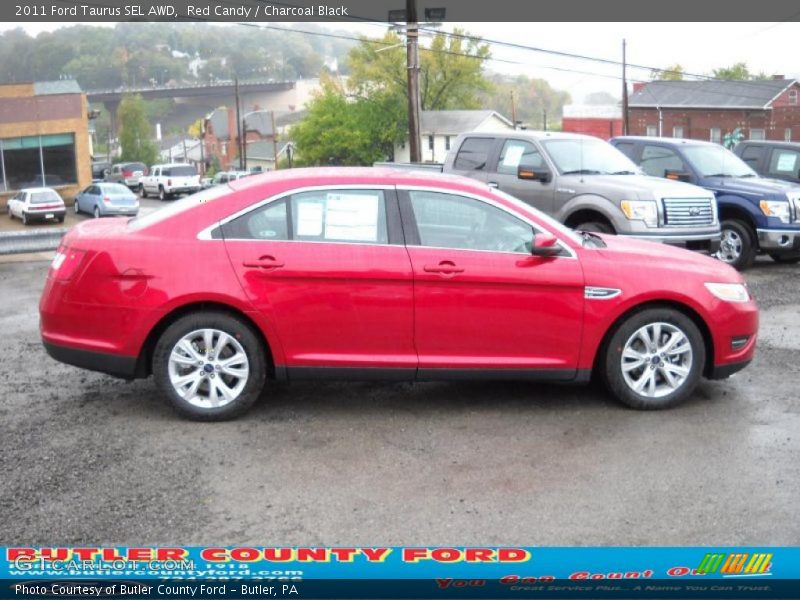 Red Candy / Charcoal Black 2011 Ford Taurus SEL AWD