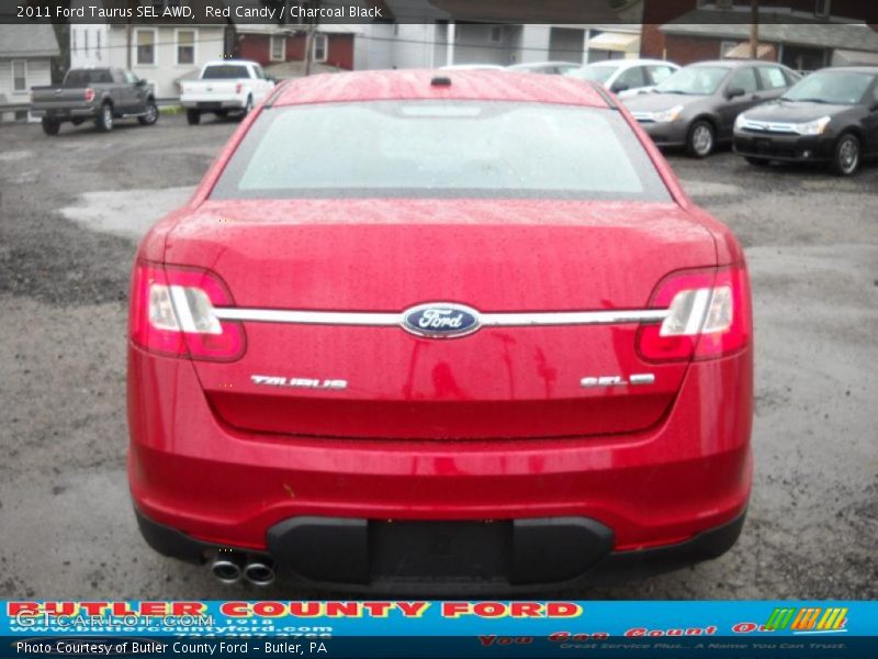 Red Candy / Charcoal Black 2011 Ford Taurus SEL AWD