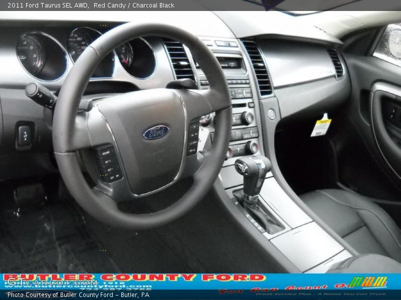 Red Candy / Charcoal Black 2011 Ford Taurus SEL AWD