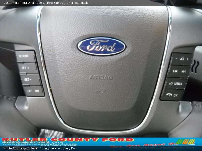Red Candy / Charcoal Black 2011 Ford Taurus SEL AWD