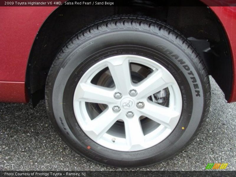 Salsa Red Pearl / Sand Beige 2009 Toyota Highlander V6 4WD