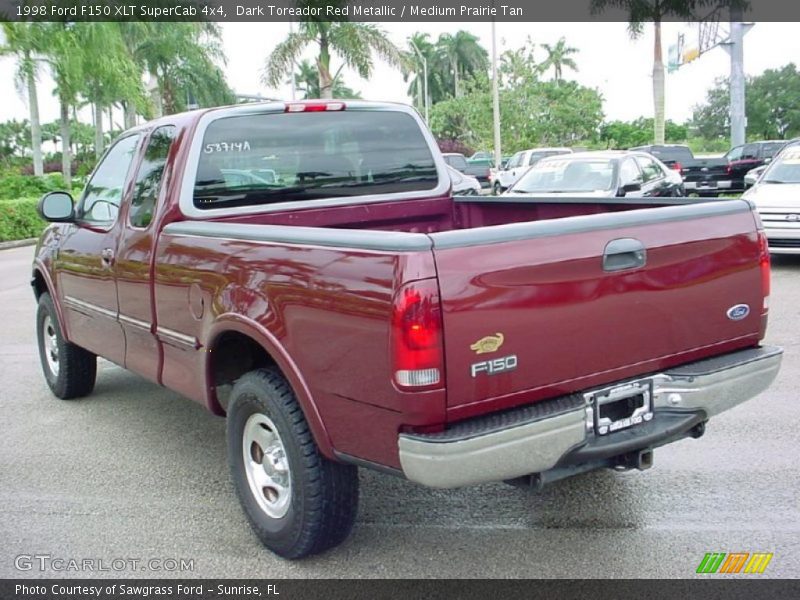 Dark Toreador Red Metallic / Medium Prairie Tan 1998 Ford F150 XLT SuperCab 4x4