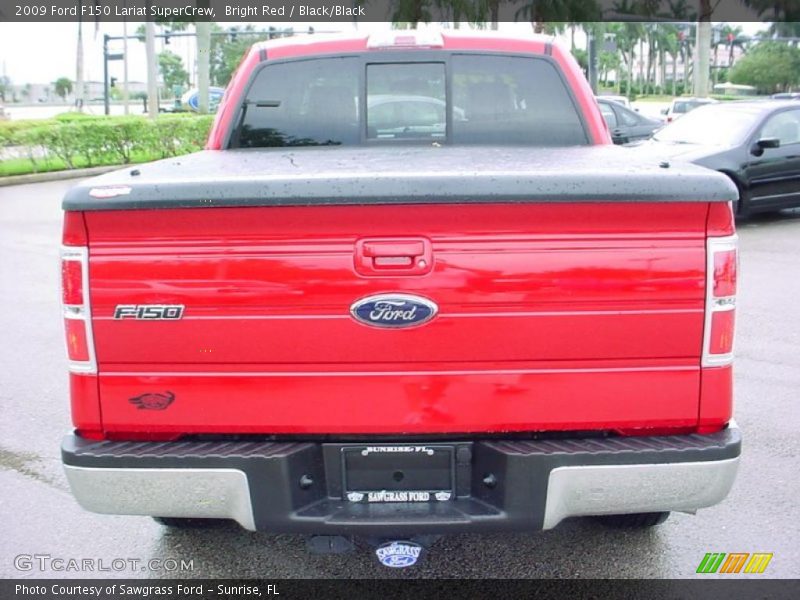 Bright Red / Black/Black 2009 Ford F150 Lariat SuperCrew