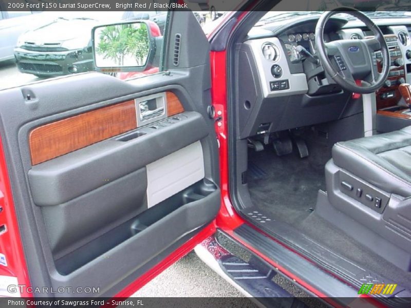 Bright Red / Black/Black 2009 Ford F150 Lariat SuperCrew