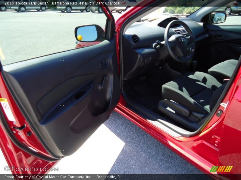 Barcelona Red Metallic / Dark Charcoal 2010 Toyota Yaris Sedan