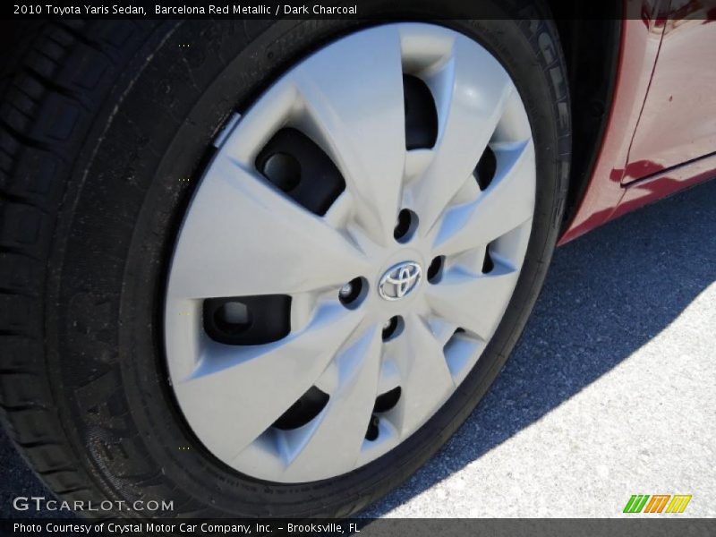 Barcelona Red Metallic / Dark Charcoal 2010 Toyota Yaris Sedan