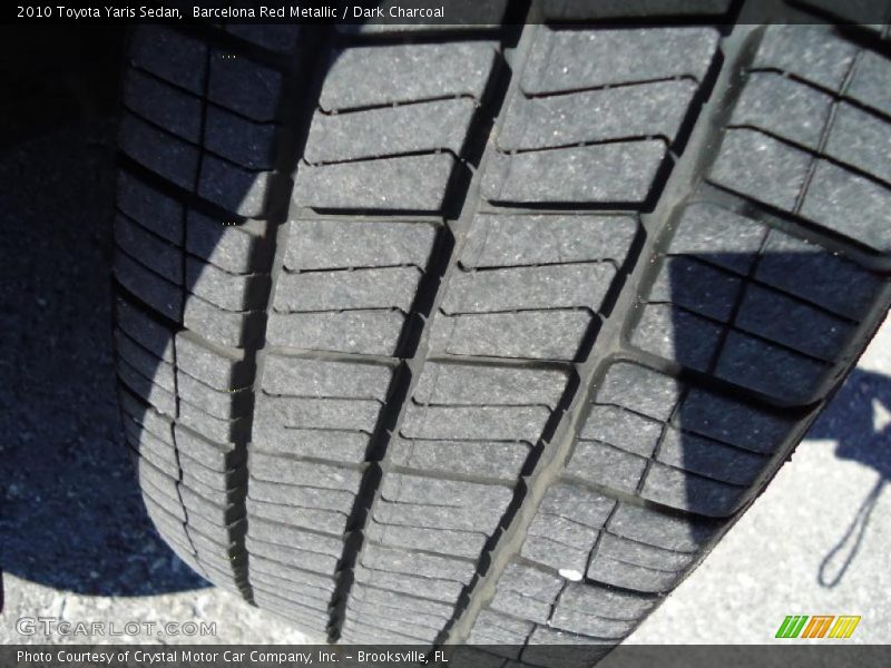 Barcelona Red Metallic / Dark Charcoal 2010 Toyota Yaris Sedan