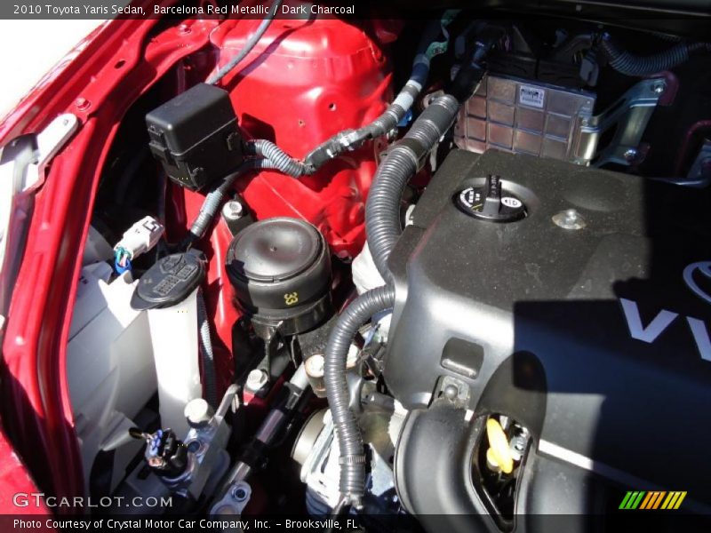 Barcelona Red Metallic / Dark Charcoal 2010 Toyota Yaris Sedan
