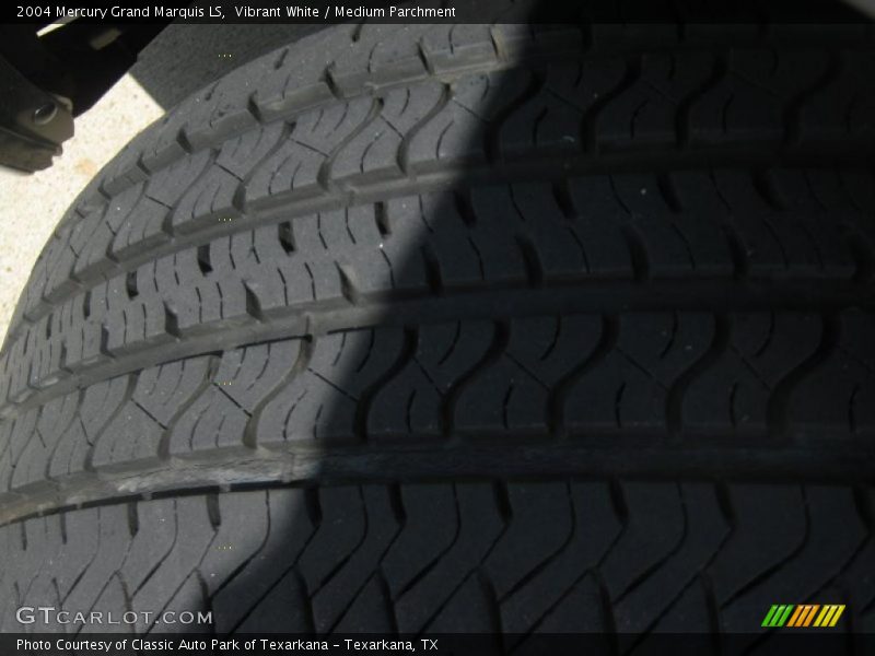 Vibrant White / Medium Parchment 2004 Mercury Grand Marquis LS
