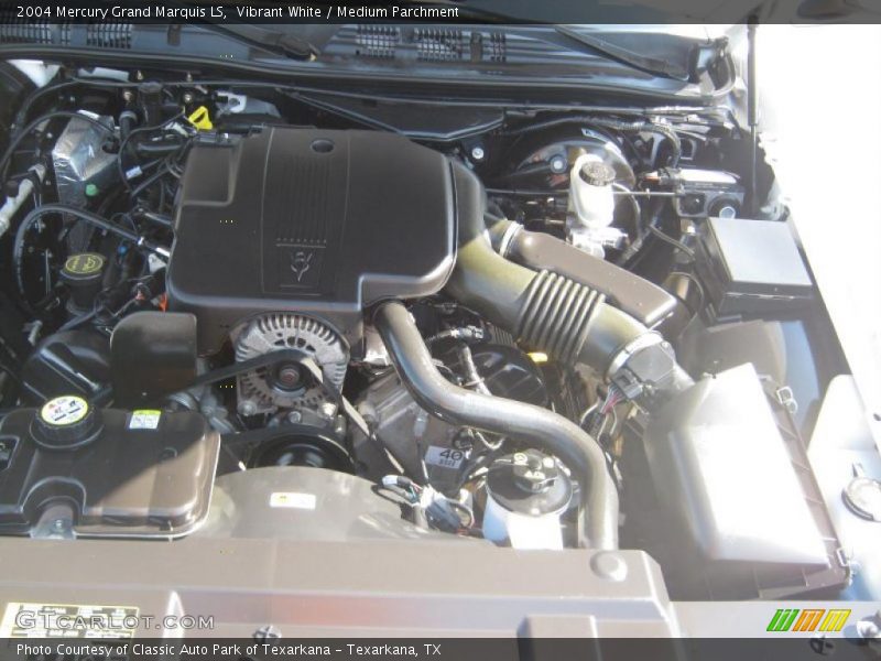 Vibrant White / Medium Parchment 2004 Mercury Grand Marquis LS