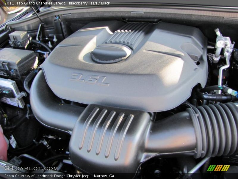 Blackberry Pearl / Black 2011 Jeep Grand Cherokee Laredo