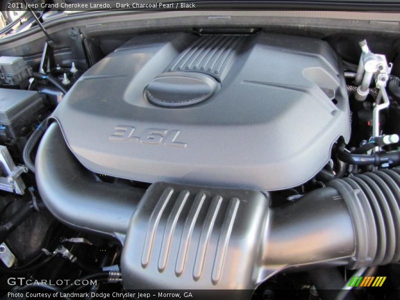 Dark Charcoal Pearl / Black 2011 Jeep Grand Cherokee Laredo
