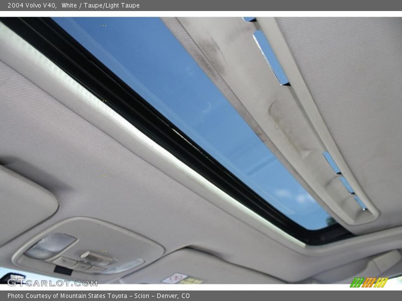 White / Taupe/Light Taupe 2004 Volvo V40