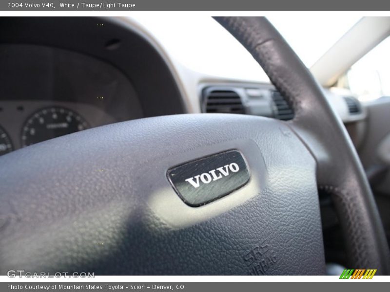 White / Taupe/Light Taupe 2004 Volvo V40