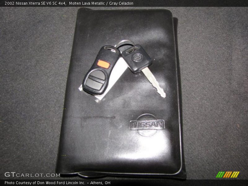 Molten Lava Metallic / Gray Celadon 2002 Nissan Xterra SE V6 SC 4x4