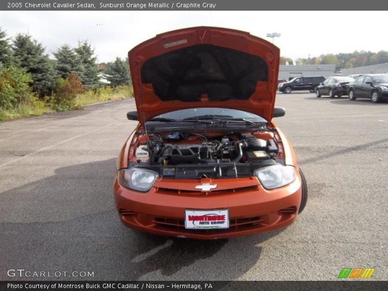 Sunburst Orange Metallic / Graphite Gray 2005 Chevrolet Cavalier Sedan