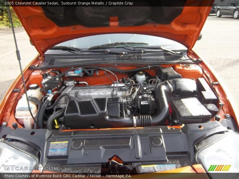 Sunburst Orange Metallic / Graphite Gray 2005 Chevrolet Cavalier Sedan