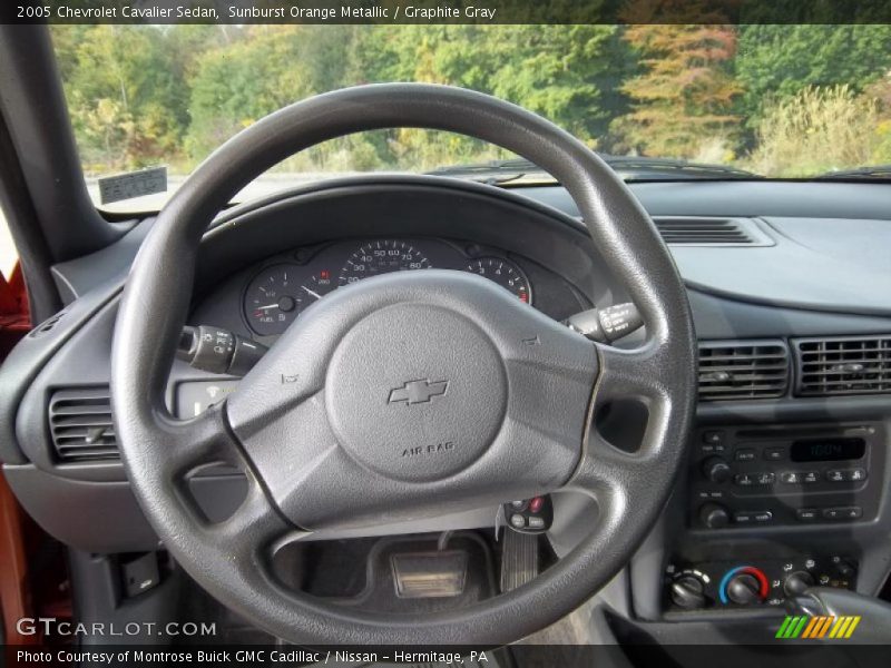 Sunburst Orange Metallic / Graphite Gray 2005 Chevrolet Cavalier Sedan