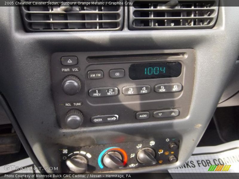Sunburst Orange Metallic / Graphite Gray 2005 Chevrolet Cavalier Sedan