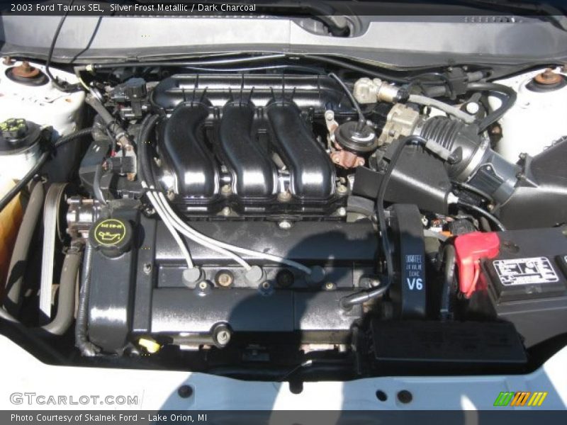 Silver Frost Metallic / Dark Charcoal 2003 Ford Taurus SEL