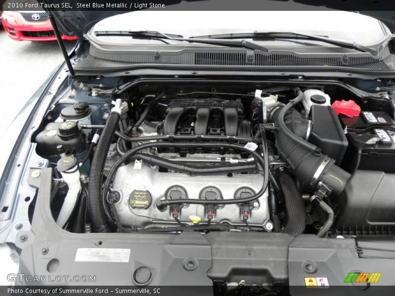 Steel Blue Metallic / Light Stone 2010 Ford Taurus SEL