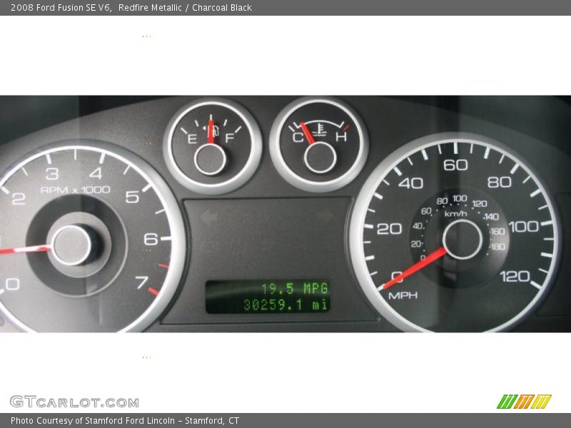 Redfire Metallic / Charcoal Black 2008 Ford Fusion SE V6