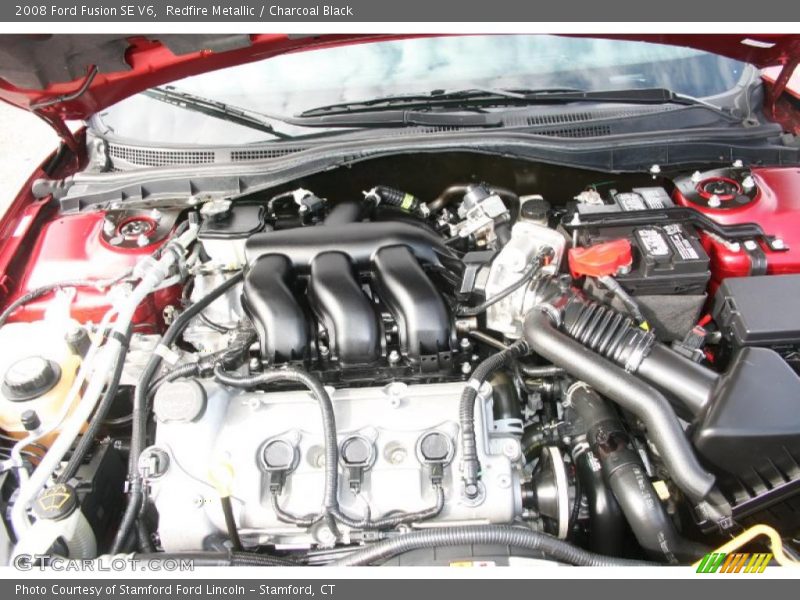 Redfire Metallic / Charcoal Black 2008 Ford Fusion SE V6