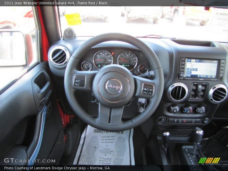 Flame Red / Black 2011 Jeep Wrangler Unlimited Sahara 4x4