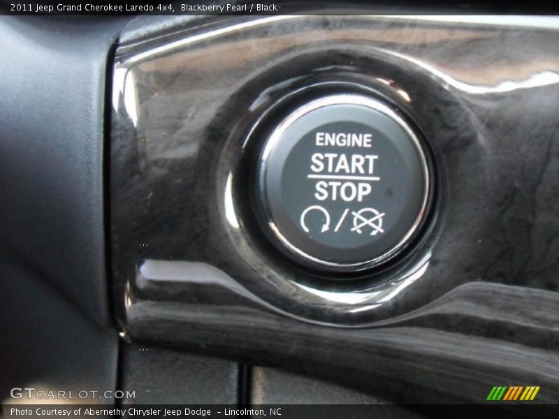 Blackberry Pearl / Black 2011 Jeep Grand Cherokee Laredo 4x4