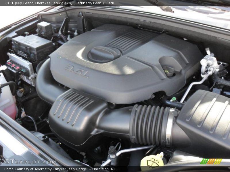 Blackberry Pearl / Black 2011 Jeep Grand Cherokee Laredo 4x4